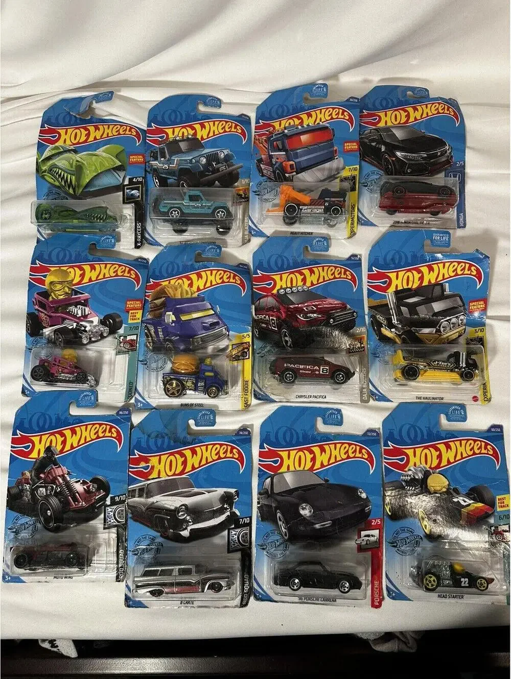 12 Car Hot Wheels Lot New In Box. Some Box Damage. See Pics